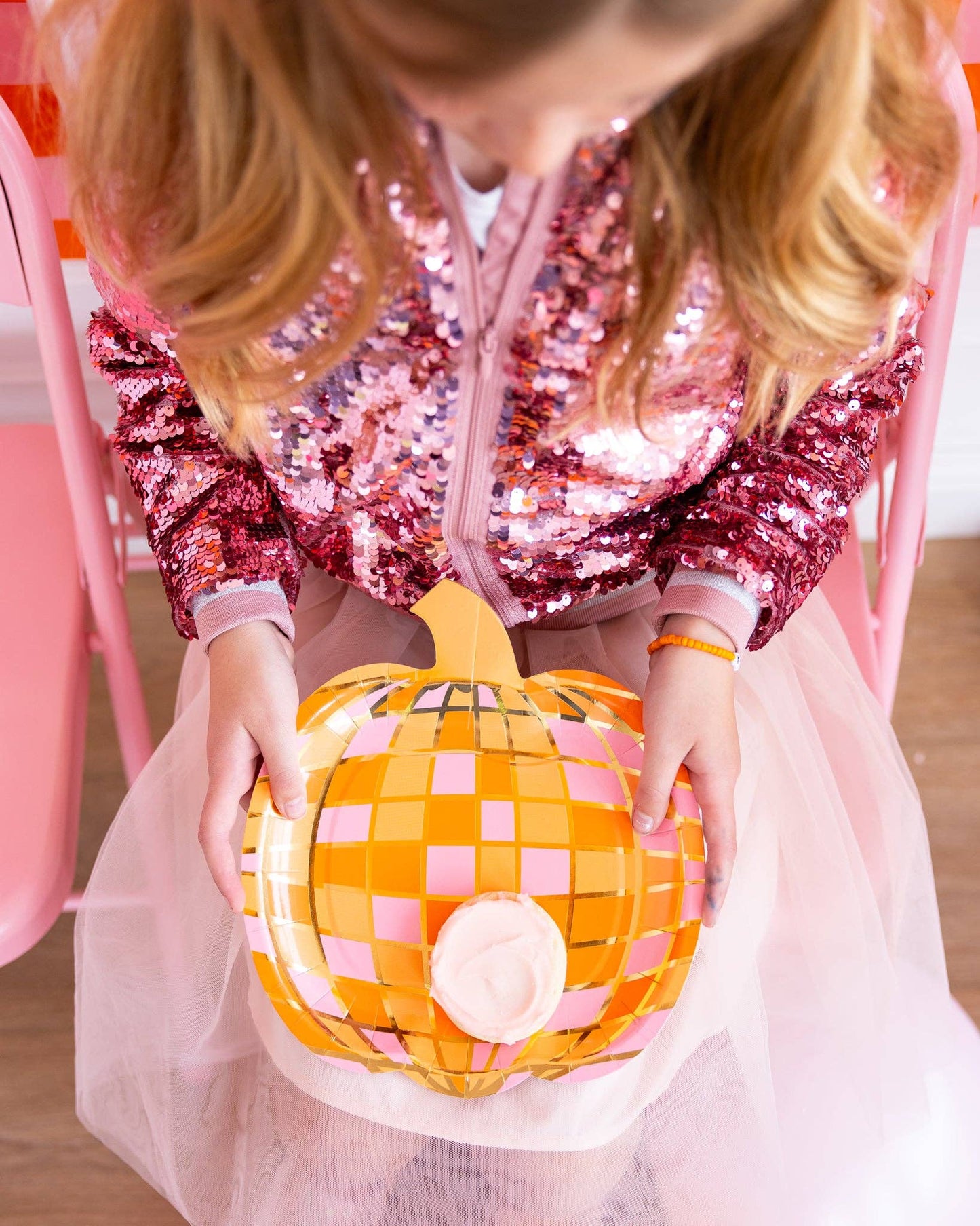 Get ready to boogie and munch with our Disco Pumpkin Paper Plate! Perfect for spicing up your Halloween party with funky vibes, this plate is perfect for serving killer snacks.