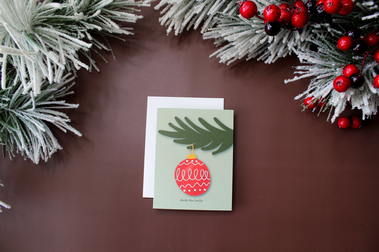 "Deck the Halls" Christmas Greeting spreads some holiday cheer with an illustrated vintage red Christmas ornament.