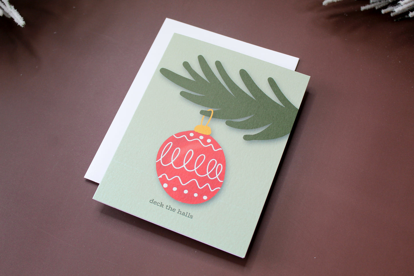 "Deck the Halls" Christmas Greeting spreads some holiday cheer with an illustrated vintage red Christmas ornament.