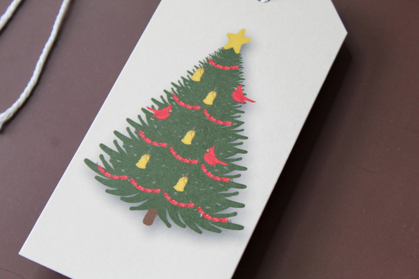 Our Cardinal Red Bird Christmas Tree gift tags add a festive touch to your holiday presents. These cute tags come in sets of eight and include pre-cut string.