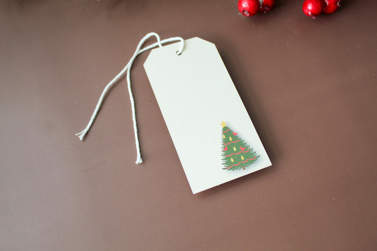 Our Cardinal Red Bird Christmas Tree gift tags add a festive touch to your holiday presents. These cute tags come in sets of eight and include pre-cut string.