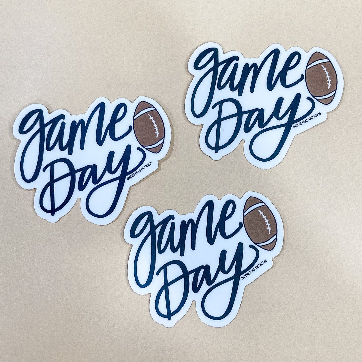 Game Day Football Sticker. Crafted from durable vinyl and dishwasher safe, it's the ideal addition to your tumbler