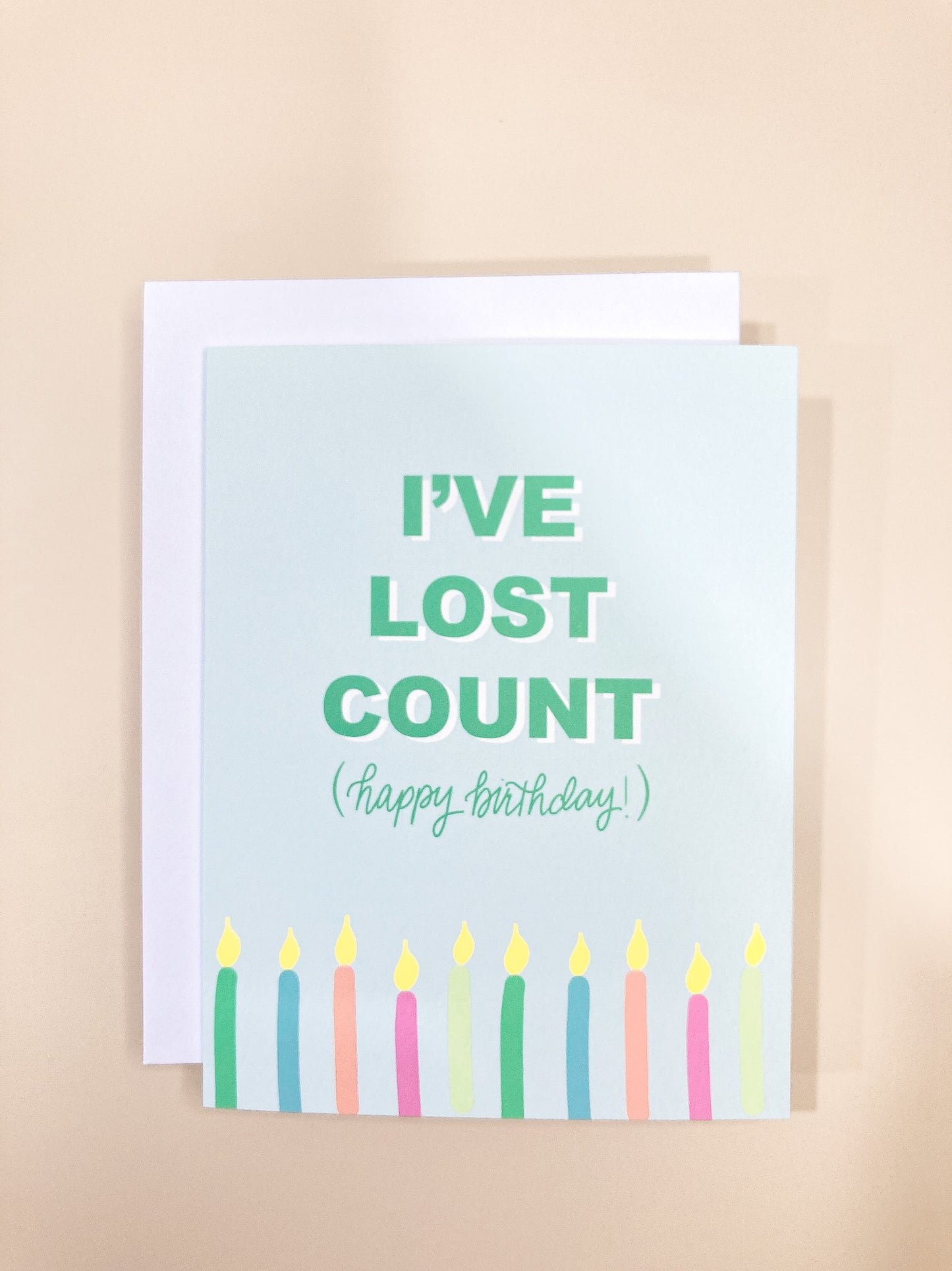 "I've lost count" birthday card is a simple but fun way to let someone know you are thinking about them on their special day. Each card is folded to 4.25" tall by 5.5" wide, is blank inside and comes with a matching white envelope. Cards are packaged in cellophane sleeves.