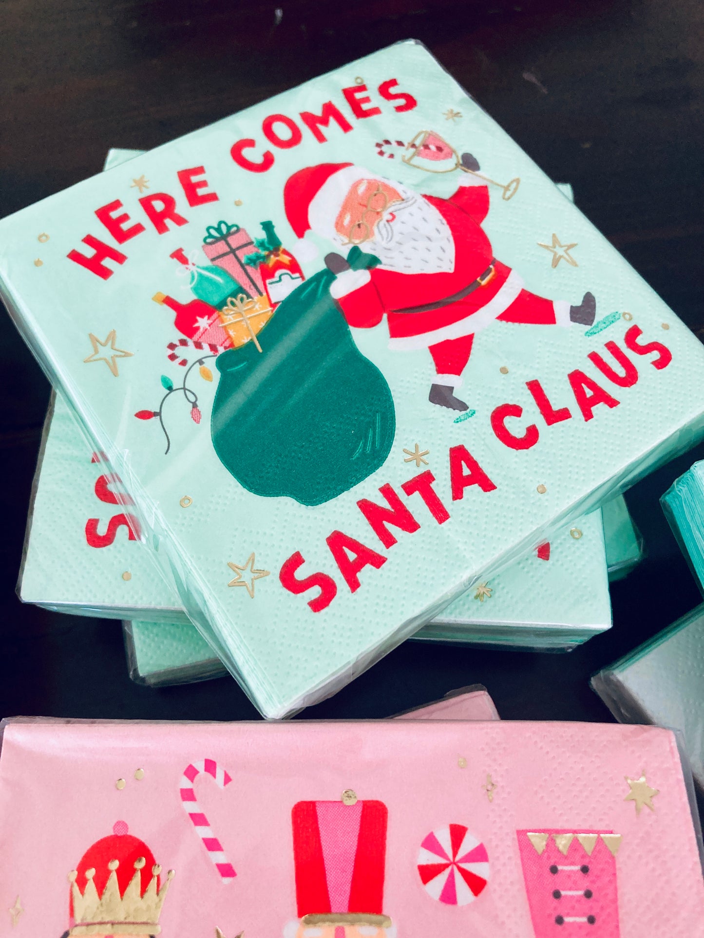 Get ready to spread some holiday cheer with Here Comes Santa Cocktail Napkins! These festive 3ply napkins feature a quirky Santa with a bag full of wine and spirits, perfect for any Christmas gathering. Each pack contains 20 napkins, measuring 5"x5", giving you plenty of napkins for all your holiday drinks. (Jolly good time guaranteed!) Festive Themed Beverage/Appetizer/Cocktail Napkins/Disposable Napkins for Holiday Parties and Entertainment 20ct Dimensions: 3 ply 5" x 5"