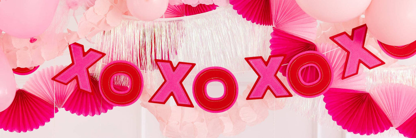 Add a playful and charming touch to your Valentine's Day celebrations with our XOXO Felt Banner! This beautifully designed banner is perfect for creating a festive atmosphere, whether you're decorating for a romantic dinner, a Galentine's Day gathering, or simply adding a bit of love to your home decor.
