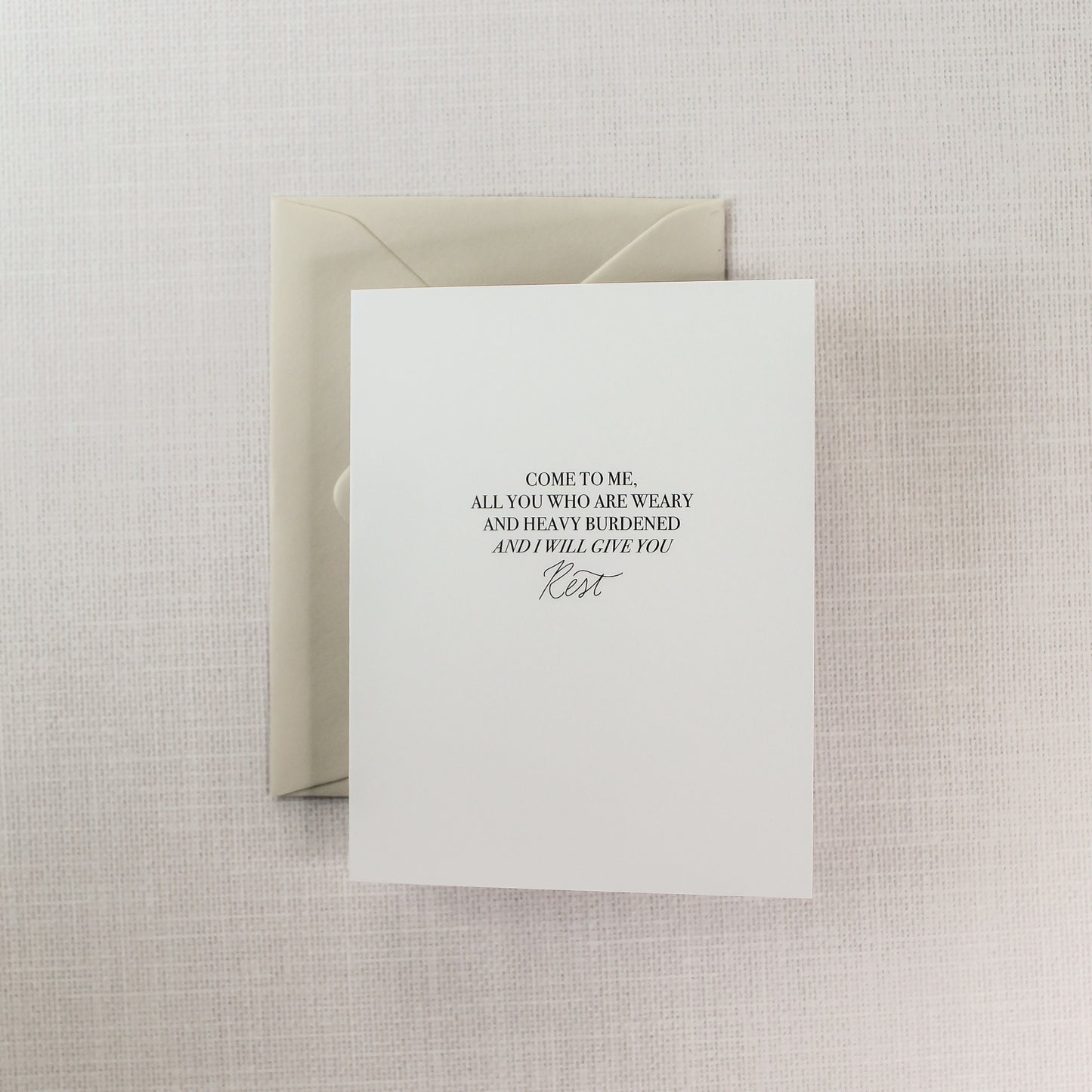 'Come to Me & I Will Give You Rest' encouraging greeting card. Featuring the uplifting message, 'Come to me all you who are weary and heavy burdened and I will give you rest,' this card provides a heartfelt message of solace.