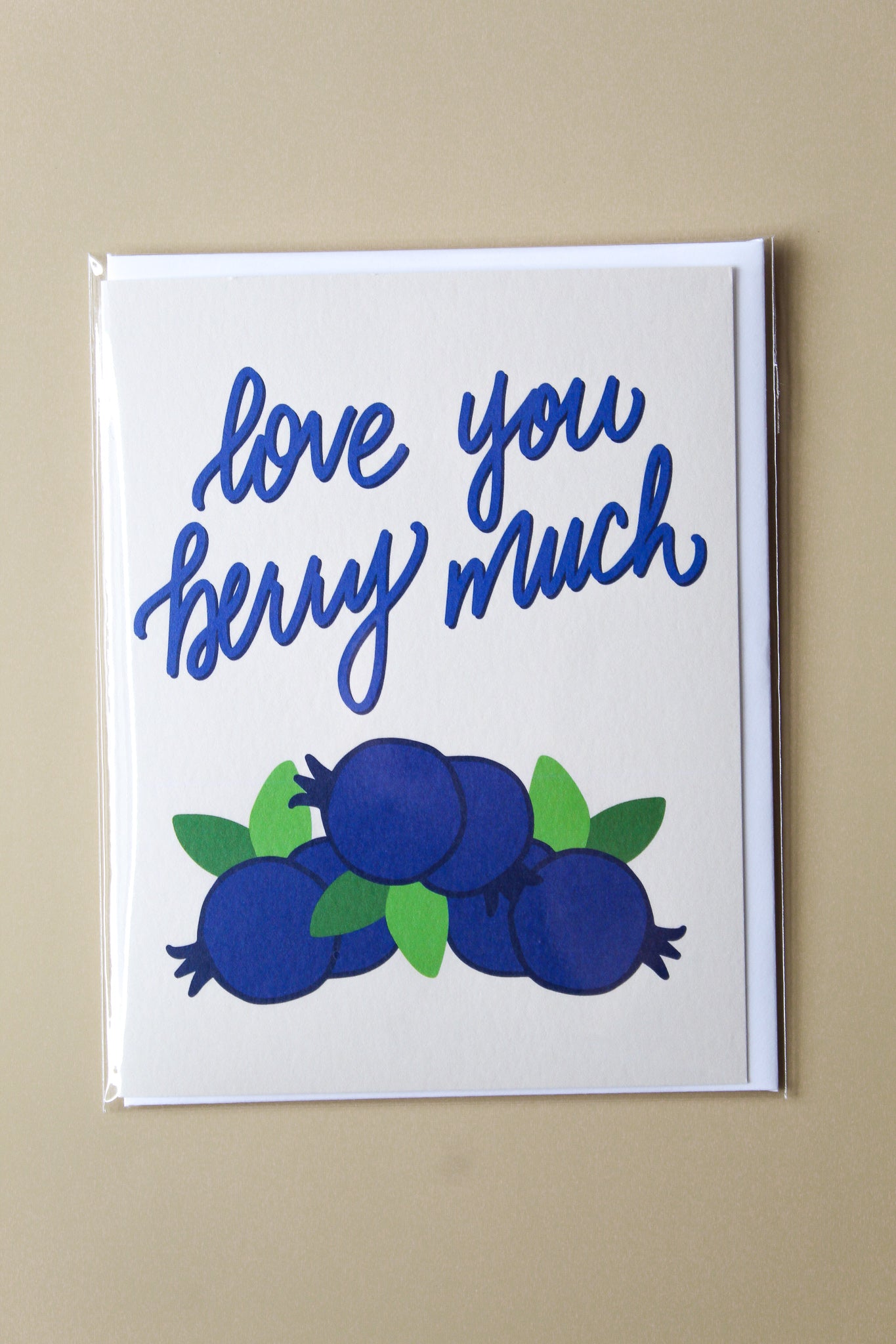 "Love You Berry Much" This card is part of our cheerful fruit collection and so sweet for a little note of love or thanks to a special friend or child. Each card is folded to 4.25" tall by 5.5" wide, is blank inside and comes with a matching white envelope. Cards are packaged in cellophane sleeves.