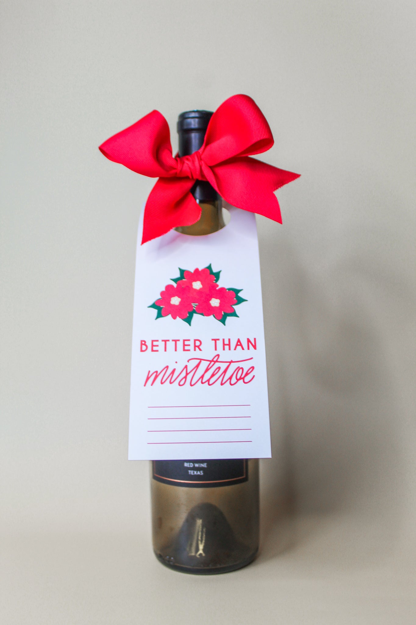hostess gift, 'Better Than Mistletoe' Bottle Neck Gift Tags. Each tag comes with pre-cut ribbon for effortless presentation