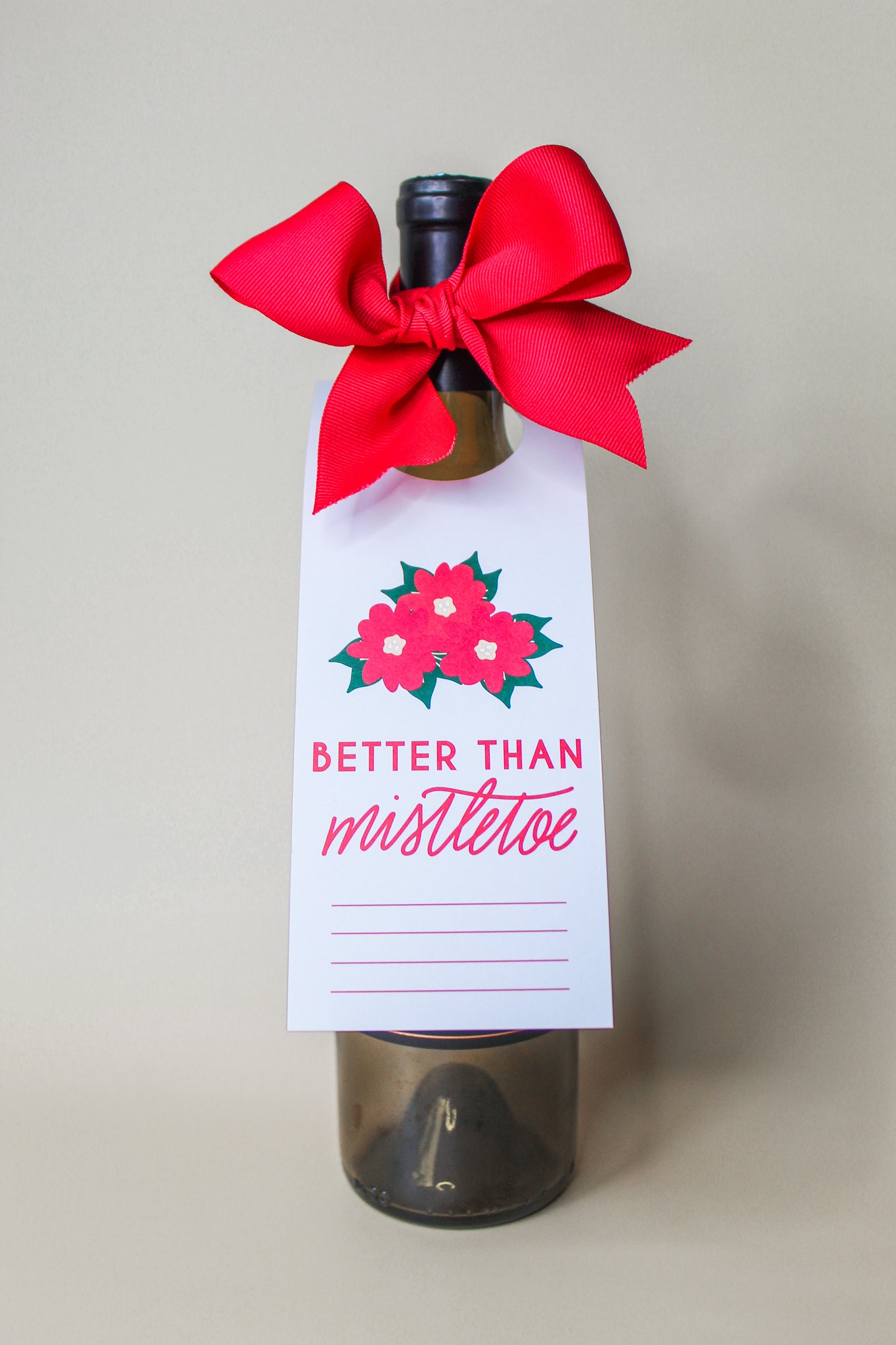 hostess gift, 'Better Than Mistletoe' Bottle Neck Gift Tags. Each tag comes with pre-cut ribbon for effortless presentation