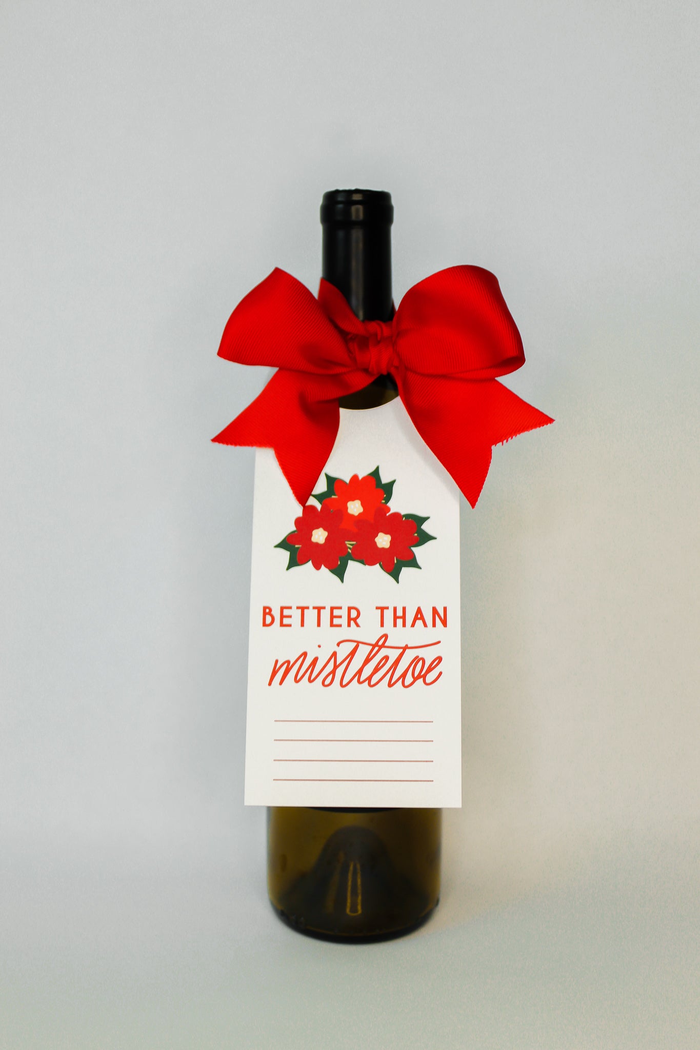 hostess gift, 'Better Than Mistletoe' Bottle Neck Gift Tags. Each tag comes with pre-cut ribbon for effortless presentation