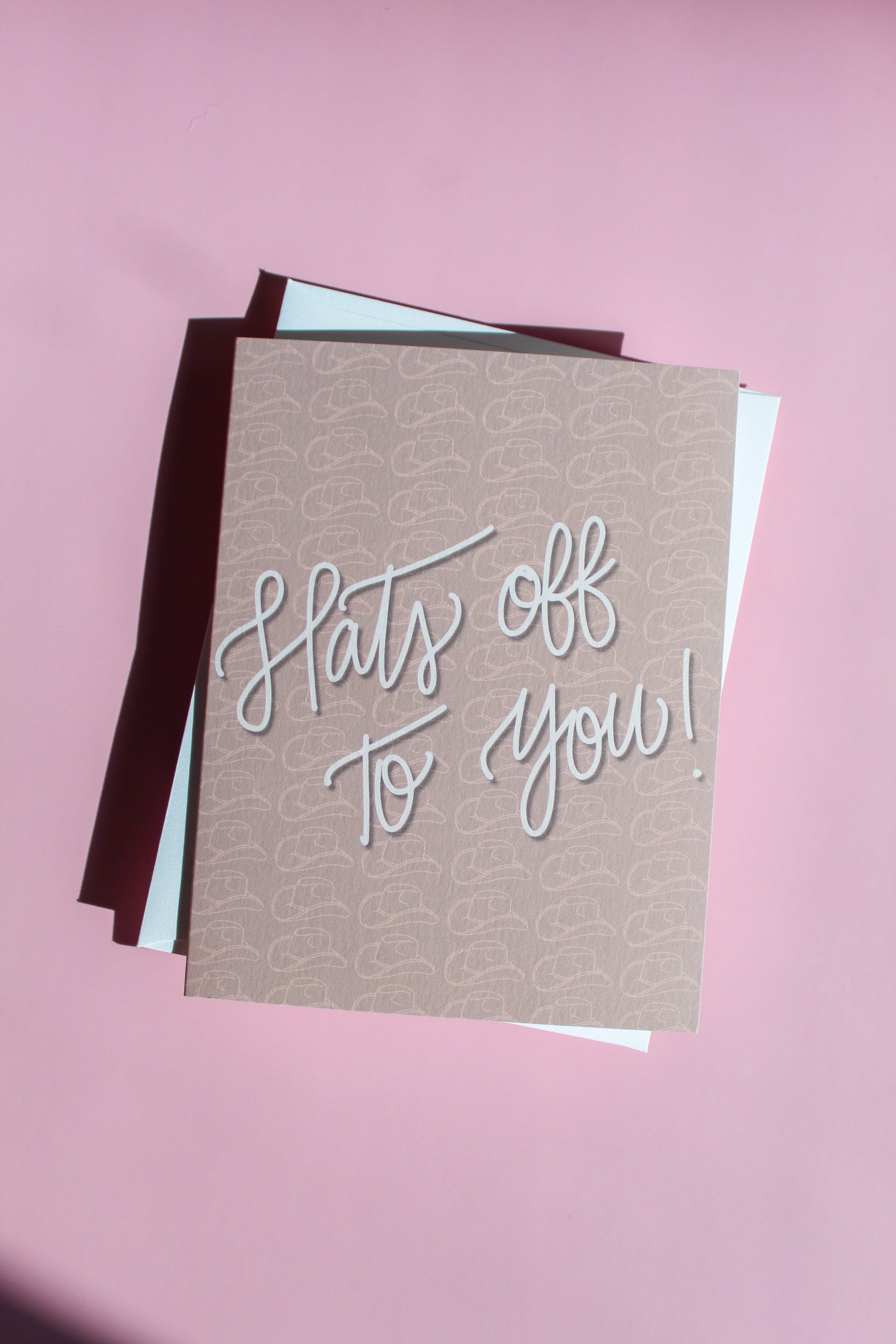 Our "Hats Off To You!" greeting card Each card is folded to 4.25" tall by 5.5" wide, is blank inside and comes with a matching white envelope. Cards are packaged in cellophane sleeves. Perfect way to accent an gift to say congratulations or good luck!
