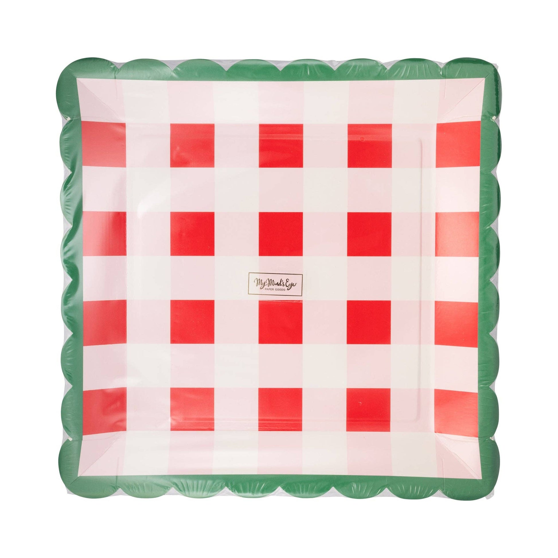 Inflatable checkered mat with red and white squares and green border on a white background