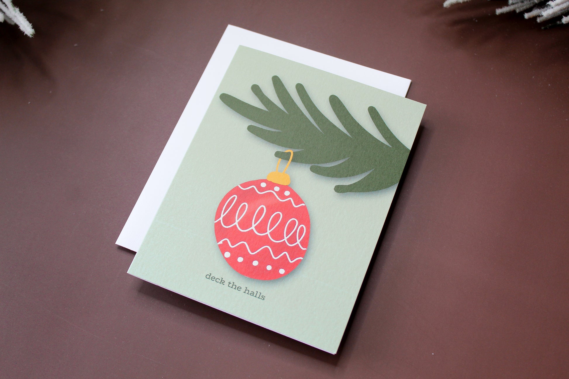 "Deck the Halls" Christmas Greeting spreads some holiday cheer with an illustrated vintage red Christmas ornament.