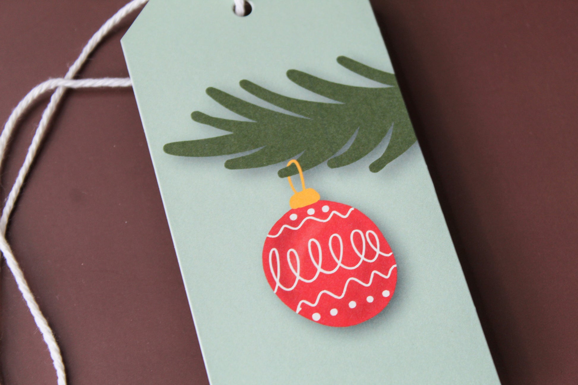 Our Red Vintage Christmas Ornament gift tags add a festive touch to your holiday presents. These cute tags come in sets of eight and include pre-cut string. 