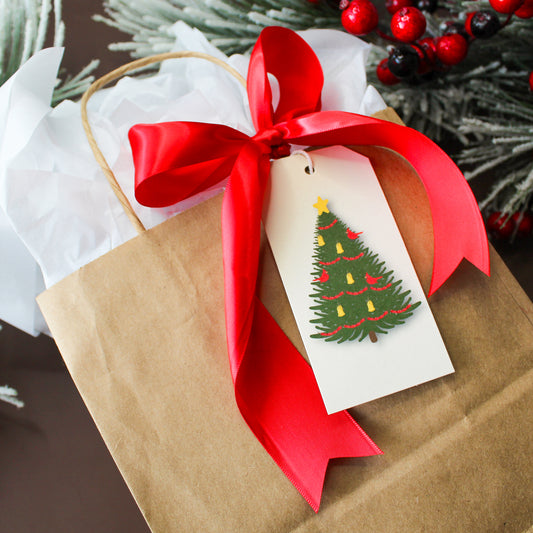 Our Cardinal Red Bird Christmas Tree gift tags add a festive touch to your holiday presents. These cute tags come in sets of eight and include pre-cut string. 