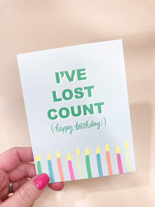 "I've lost count" birthday card is a simple but fun way to let someone know you are thinking about them on their special day.  Each card is folded to 4.25" tall by 5.5" wide, is blank inside and comes with a matching white envelope. Cards are packaged in cellophane sleeves.