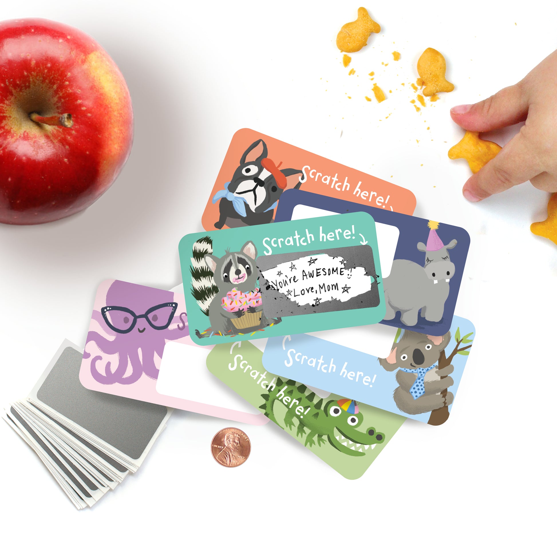24 scratch-off lunchbox notes! Simply write your own special handwritten message in the designated area, cover it with the scratch-off sticker provided, and scratch to reveal your hidden message! These tiny notes are the perfect size to slip into a lunch bag or coat pocket of someone special. Animal Scratch off note cards