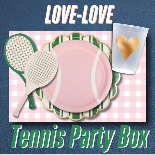 tennis party box with pink tennis plate, rackets, and gold heart cup