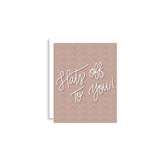 Our "Hats Off To You!" greeting card Each card is folded to 4.25" tall by 5.5" wide, is blank inside and comes with a matching white envelope. Cards are packaged in cellophane sleeves. Perfect way to accent an gift to say congratulations or good luck! 