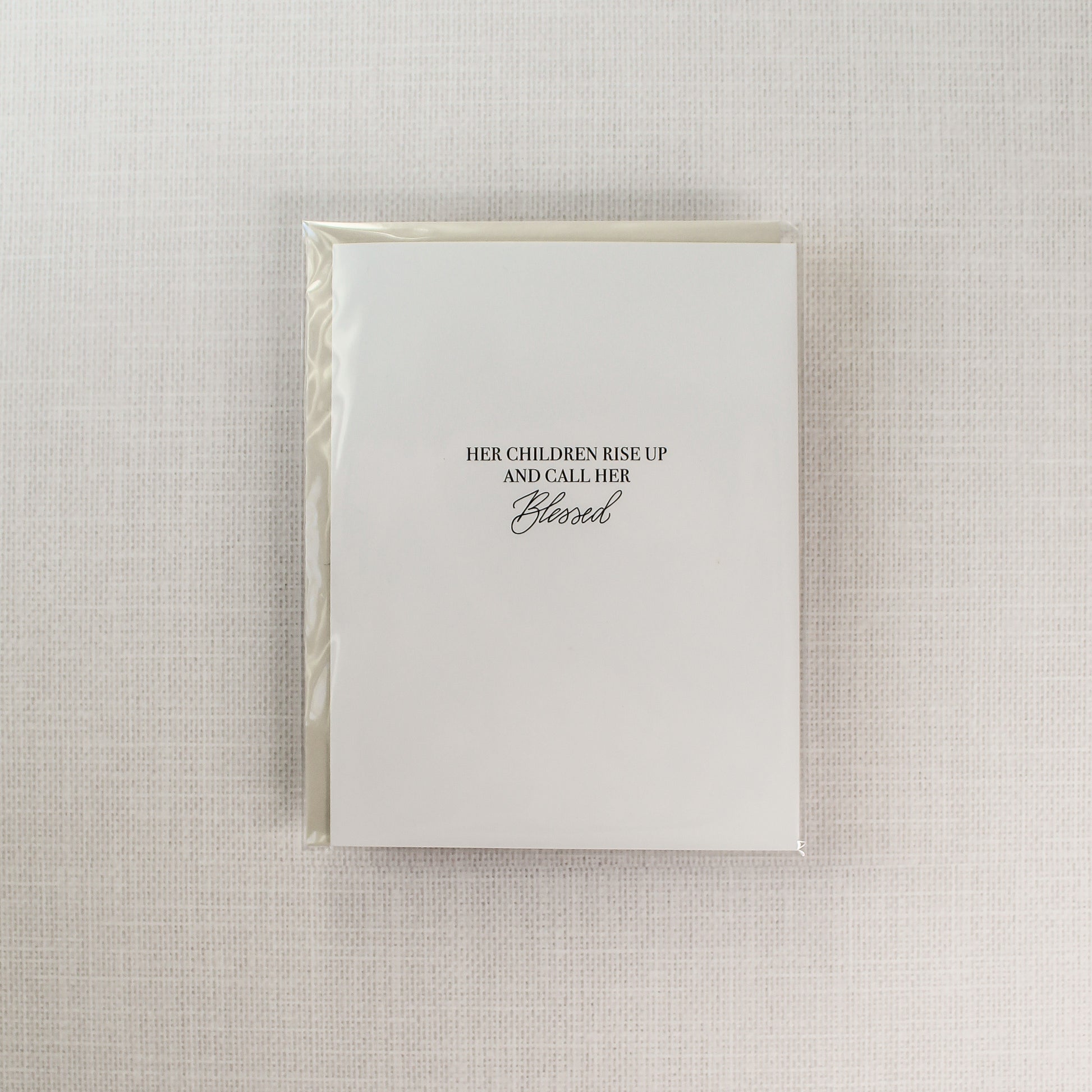 Card reads: "Her Children Rise Up And Call Her Blessed."   Each card features digitized hand calligraphy, is printed on a heavy white card stock paper and includes a matching envelope. Cards measure 5.5"x4.25" folded, open horizontally and are blank on the inside.