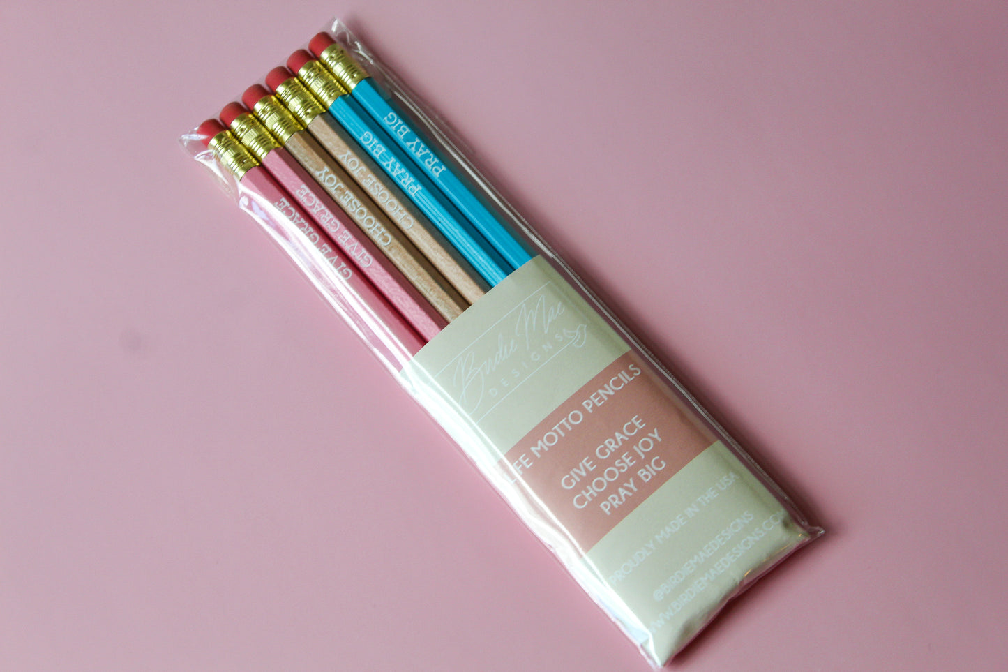 Give Grace, Choose Joy, Pray Big Pencil Set is a hopeful Pencil Set that has six pencils: two pink pencils imprinted with "give grace", two natural wood pencils imprinted with "choose joy" and two blue pencils imprinted with "pray big. 