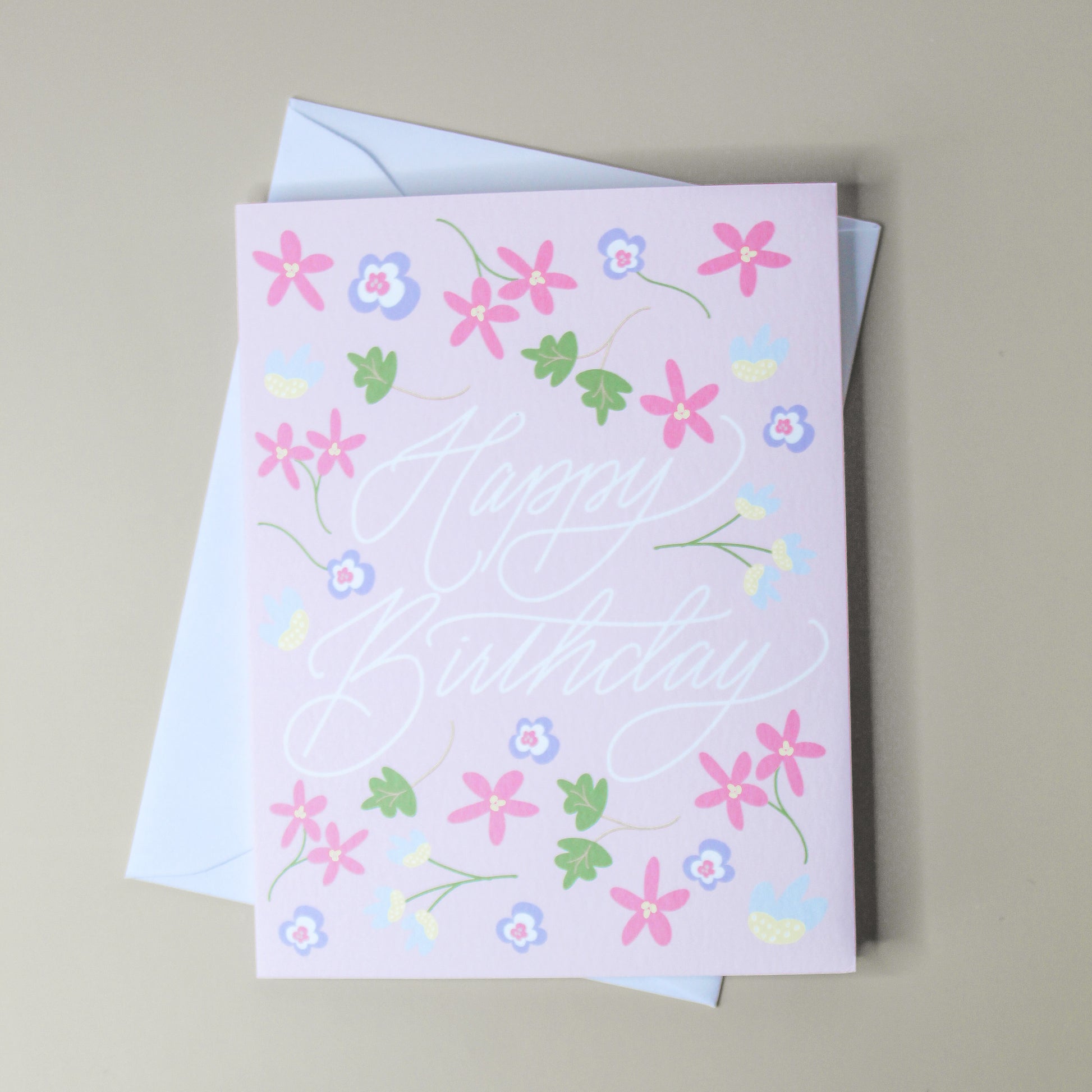 Our "Happy Birthday" card is too cute! Each card is folded to 4.25" tall by 5.5" wide, is blank inside and comes with a matching white envelope. Cards are packaged in cellophane sleeves.