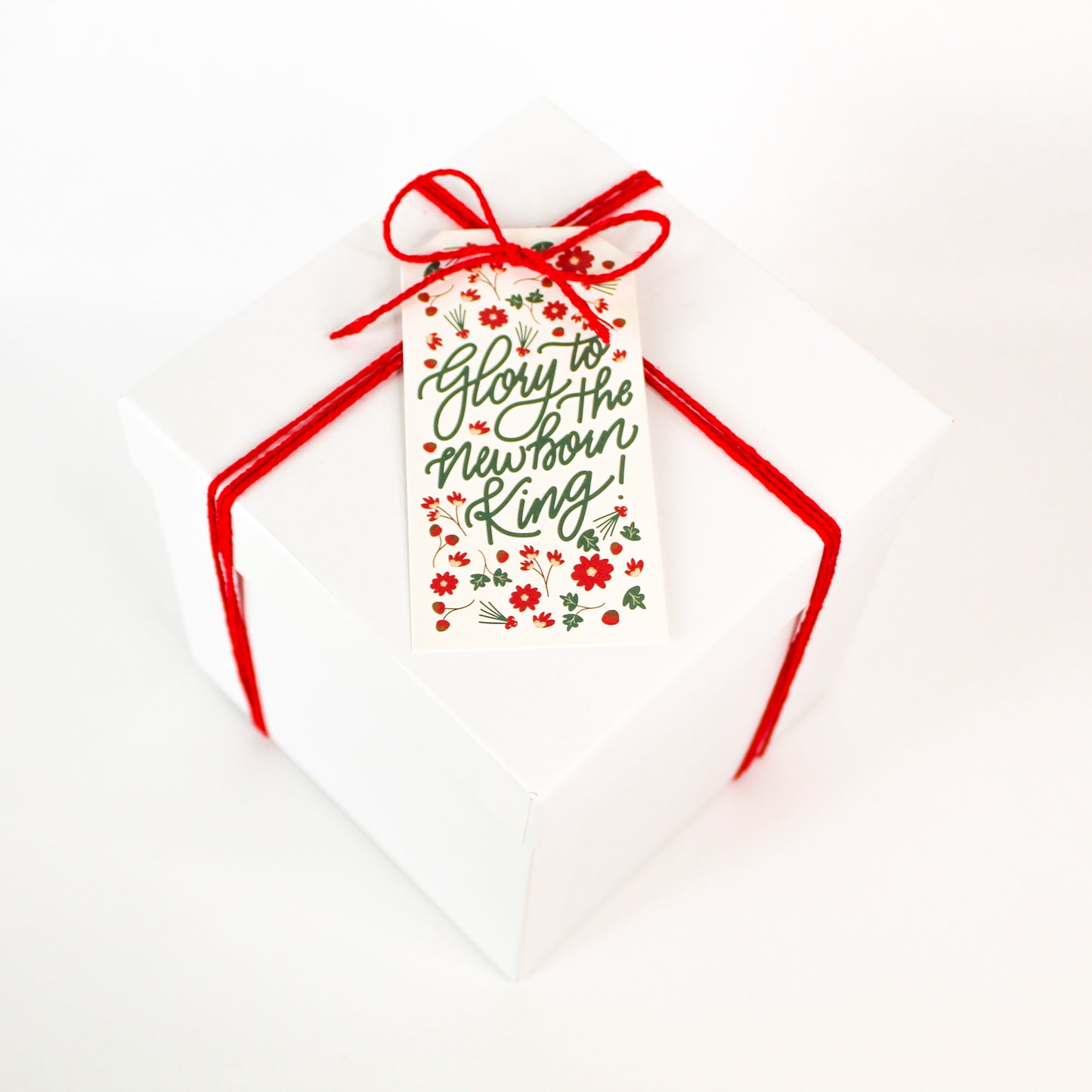 "Glory to the Newborn King!" Christmas gift tags add a festive touch to your holiday presents.  These cute tags come in sets of eight and include red string.