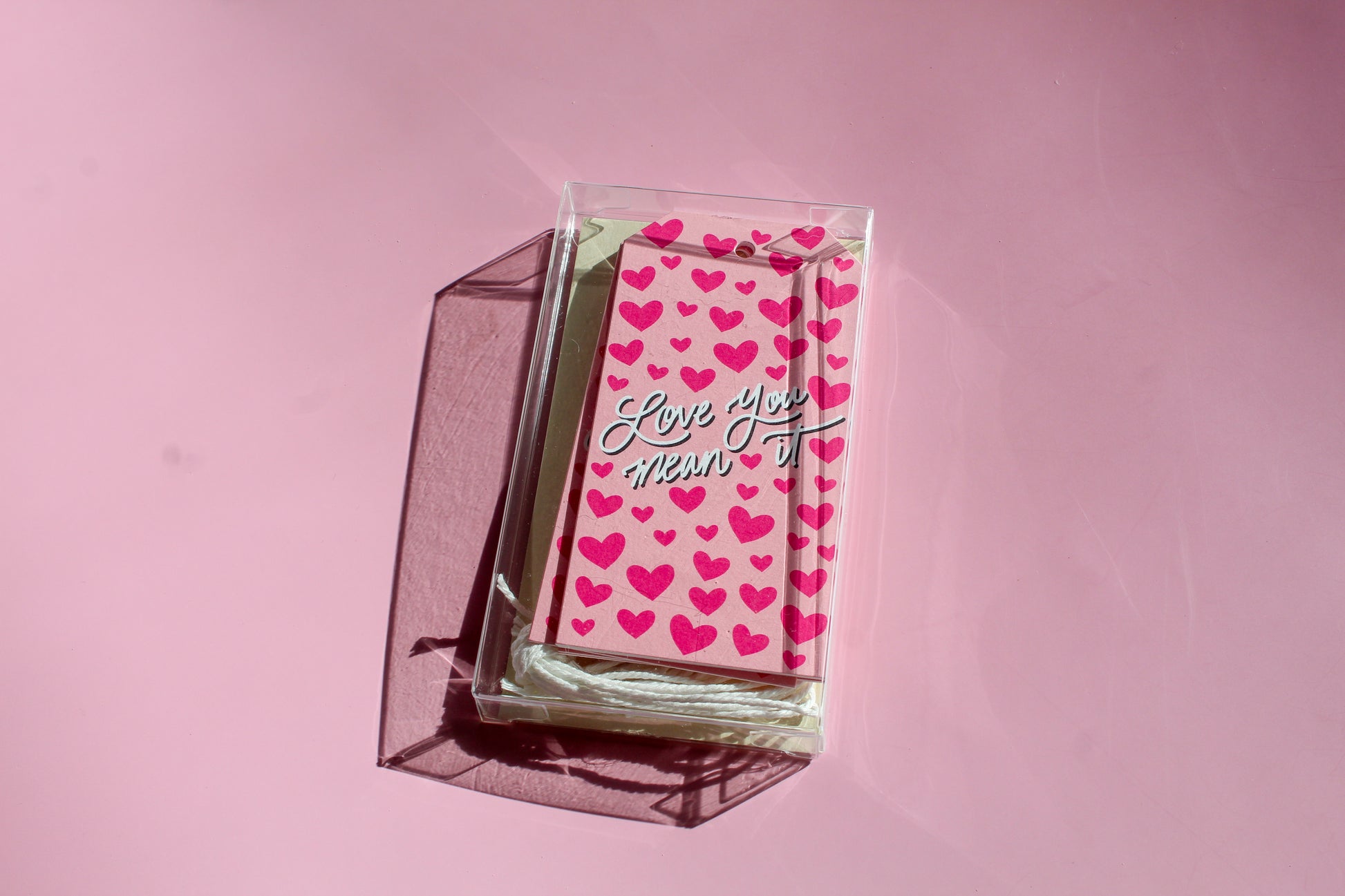 "Love You, Mean It!" Valentine tags come in sets of eight and include white string. 