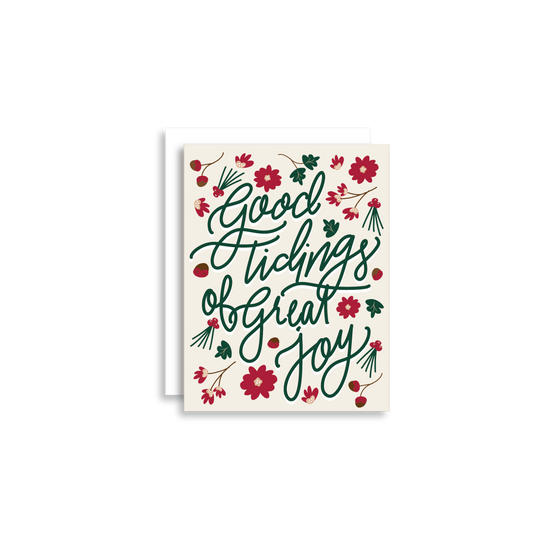"Good Tidings of Great Joy" Christmas Greeting Card is a festive way to bring joy during the holiday season. Each card is folded to 4.25" tall by 5.5" wide, is blank inside and comes with a matching white envelope. Cards are packaged in cellophane sleeves. 